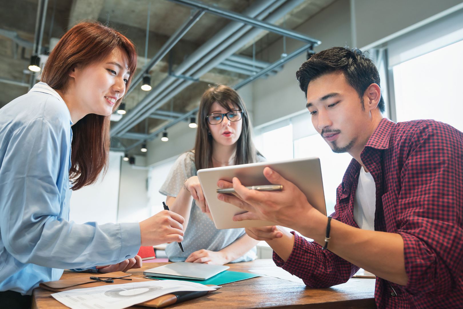 Young employees having a meeting in an office